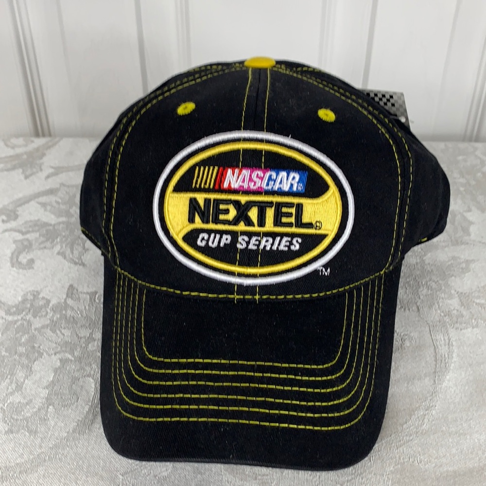 NWT Checkered Flag Sports black and yellow Nextel NASCAR cup series. Velcro back
